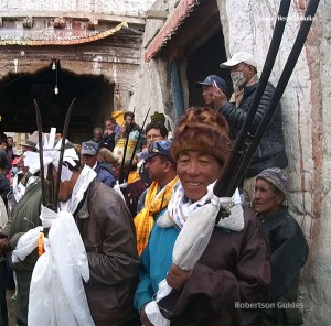 The gunmen arrive as the procession leaves the city of Lo Manthang, Nepal